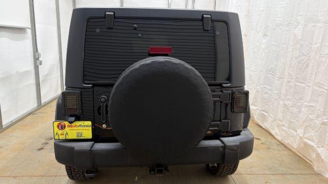 2017 Black Jeep Wrangler Unlimited Sport 4x4 (1C4BJWDG1HL) with an Pentastar 3.6L V-6 DOHC engine, located at 1806 Veterans Memorial Hwy SW, Austell, GA, 30168, (770) 944-9558, 33.817959, -84.606987 - Photo#4