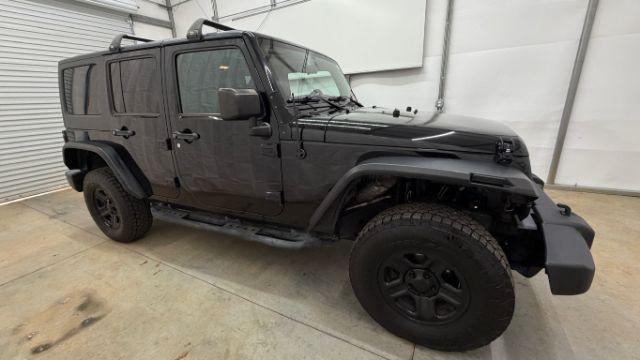 2017 Black Jeep Wrangler Unlimited Sport 4x4 (1C4BJWDG1HL) with an Pentastar 3.6L V-6 DOHC engine, located at 1806 Veterans Memorial Hwy SW, Austell, GA, 30168, (770) 944-9558, 33.817959, -84.606987 - Photo#7
