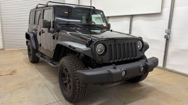 2017 Black Jeep Wrangler Unlimited Sport 4x4 (1C4BJWDG1HL) with an Pentastar 3.6L V-6 DOHC engine, located at 1806 Veterans Memorial Hwy SW, Austell, GA, 30168, (770) 944-9558, 33.817959, -84.606987 - Photo#8