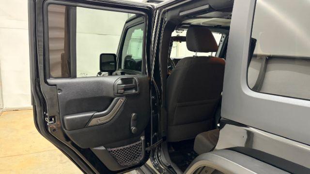 2017 Black Jeep Wrangler Unlimited Sport 4x4 (1C4BJWDG1HL) with an Pentastar 3.6L V-6 DOHC engine, located at 1806 Veterans Memorial Hwy SW, Austell, GA, 30168, (770) 944-9558, 33.817959, -84.606987 - Photo#13