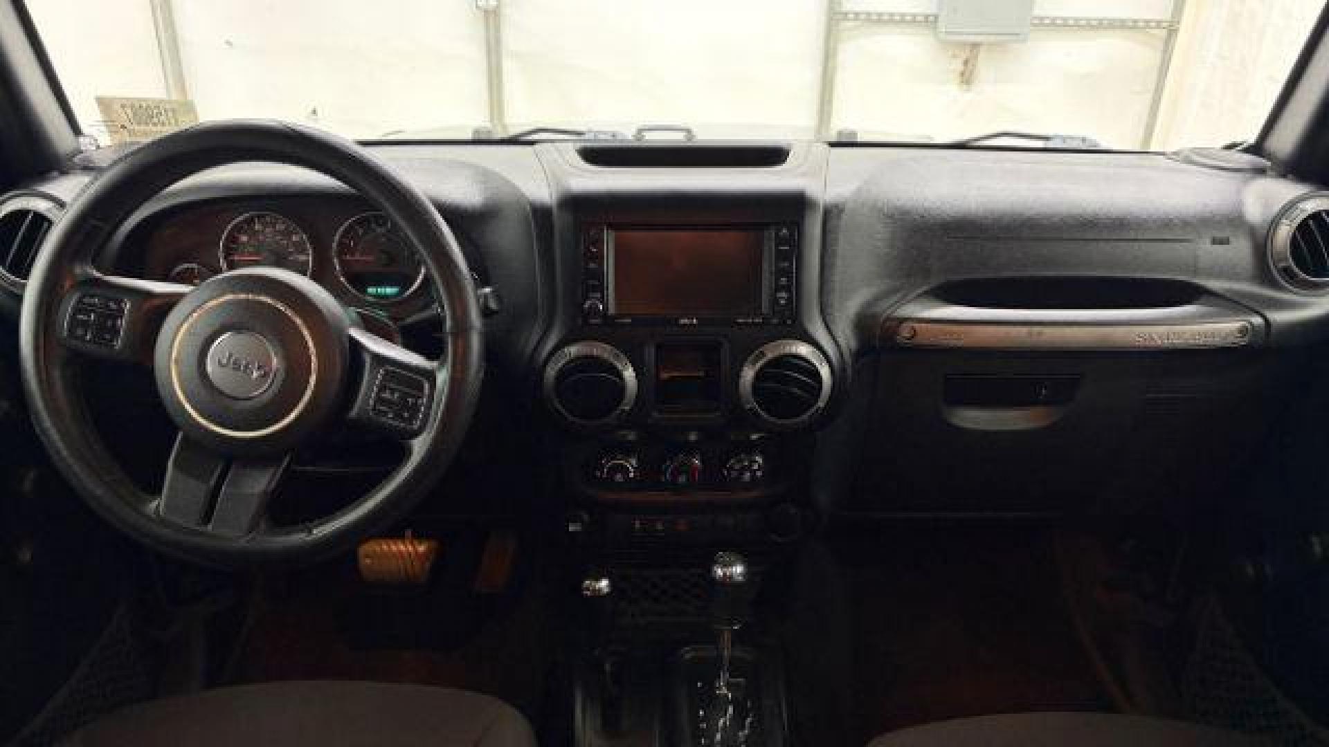 2017 Black Jeep Wrangler Unlimited Sport 4x4 (1C4BJWDG1HL) with an Pentastar 3.6L V-6 DOHC engine, located at 1806 Veterans Memorial Hwy SW, Austell, GA, 30168, (770) 944-9558, 33.817959, -84.606987 - Photo#15