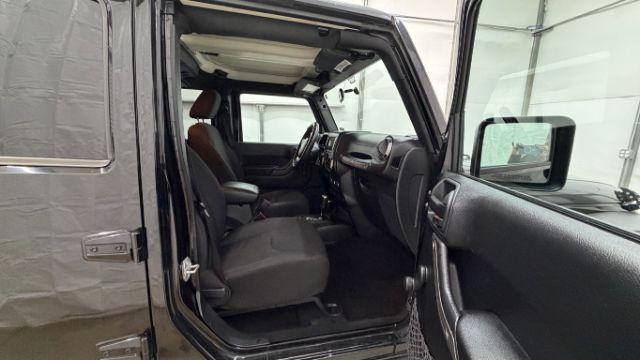 2017 Black Jeep Wrangler Unlimited Sport 4x4 (1C4BJWDG1HL) with an Pentastar 3.6L V-6 DOHC engine, located at 1806 Veterans Memorial Hwy SW, Austell, GA, 30168, (770) 944-9558, 33.817959, -84.606987 - Photo#18