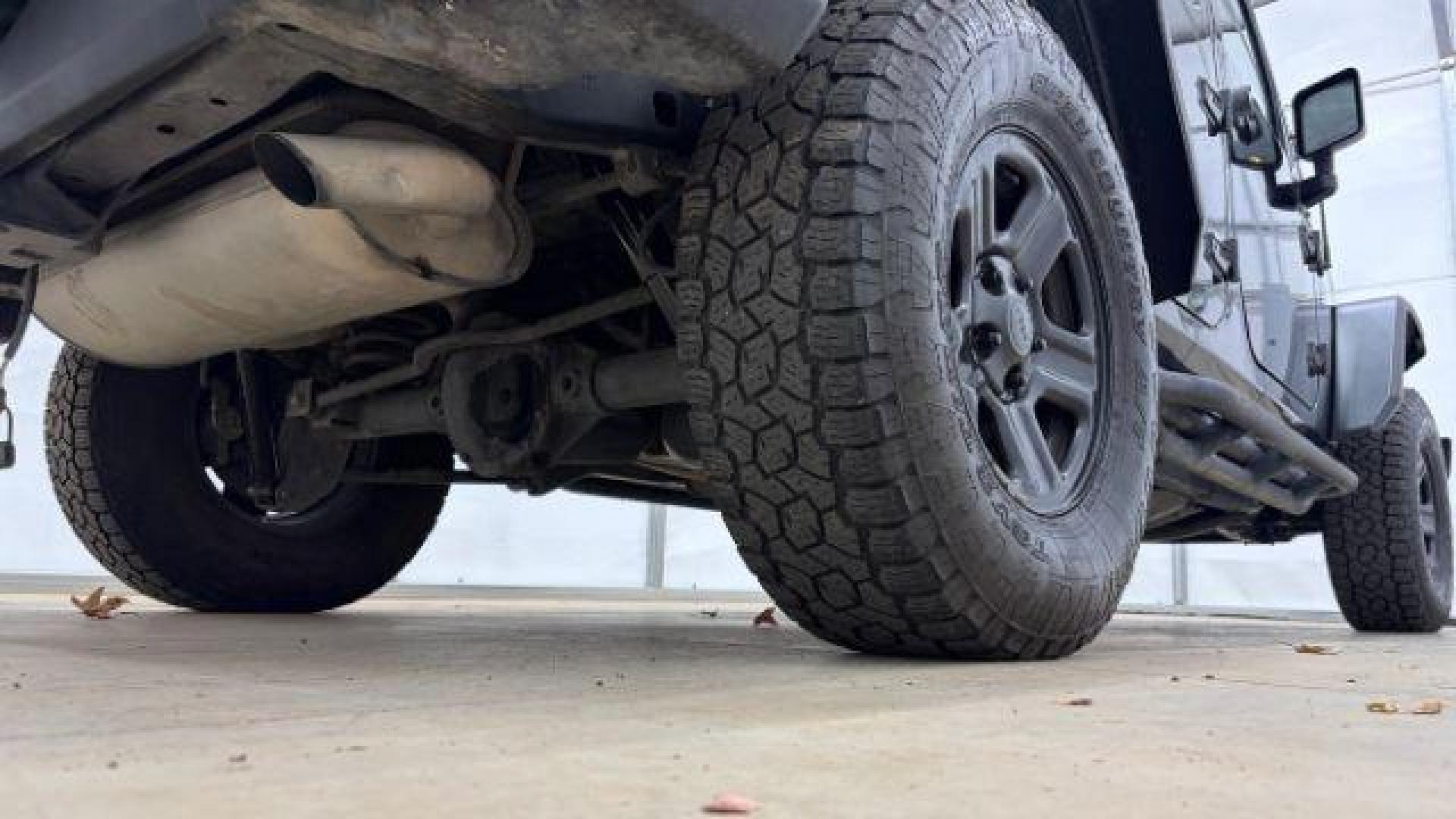 2017 Black Jeep Wrangler Unlimited Sport 4x4 (1C4BJWDG1HL) with an Pentastar 3.6L V-6 DOHC engine, located at 1806 Veterans Memorial Hwy SW, Austell, GA, 30168, (770) 944-9558, 33.817959, -84.606987 - Photo#20