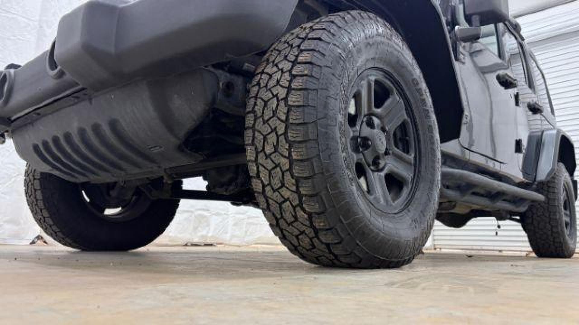 2017 Black Jeep Wrangler Unlimited Sport 4x4 (1C4BJWDG1HL) with an Pentastar 3.6L V-6 DOHC engine, located at 1806 Veterans Memorial Hwy SW, Austell, GA, 30168, (770) 944-9558, 33.817959, -84.606987 - Photo#21