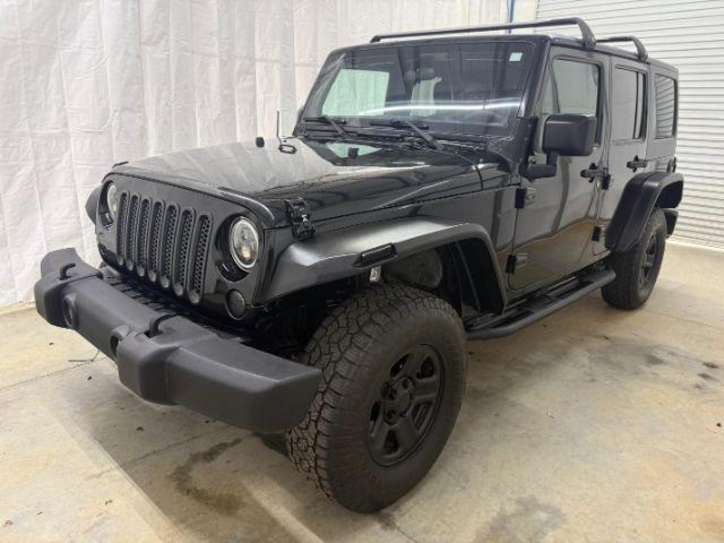 2017 Black /Black Jeep Wrangler Unlimited Sport 4x4 (1C4BJWDG1HL) with an Pentastar 3.6L V-6 DOHC engine, located at 1806 Veterans Memorial Hwy SW, Austell, GA, 30168, (770) 944-9558, 33.817959, -84.606987 - Photo#0