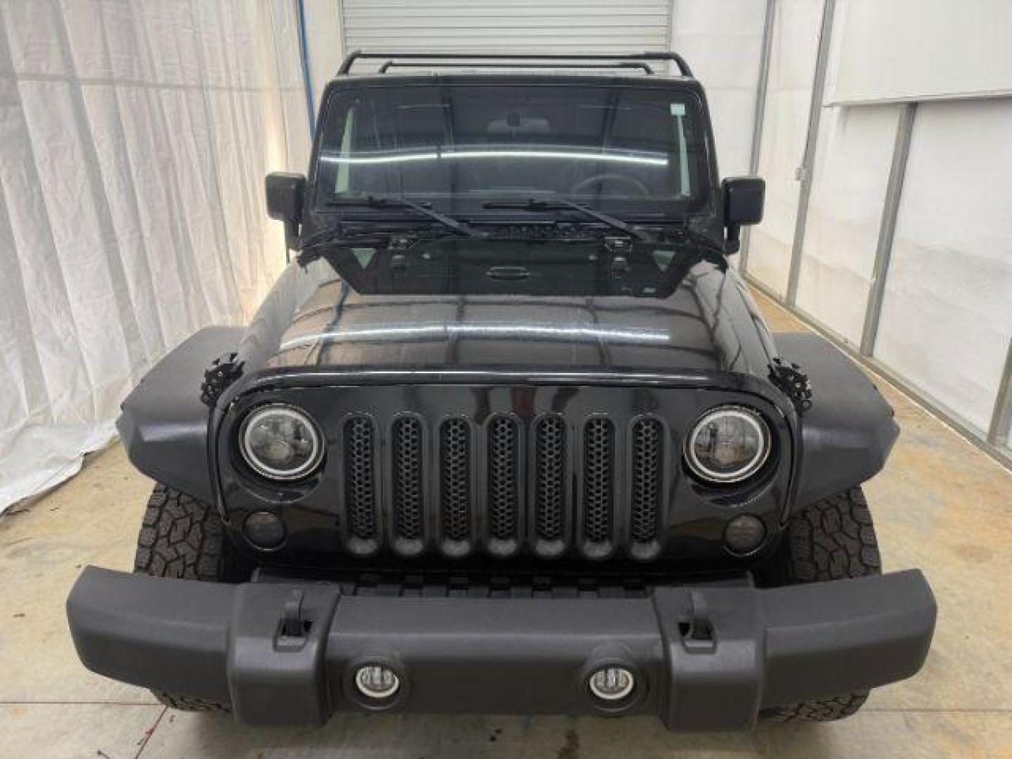 2017 Black /Black Jeep Wrangler Unlimited Sport 4x4 (1C4BJWDG1HL) with an Pentastar 3.6L V-6 DOHC engine, located at 1806 Veterans Memorial Hwy SW, Austell, GA, 30168, (770) 944-9558, 33.817959, -84.606987 - Photo#2