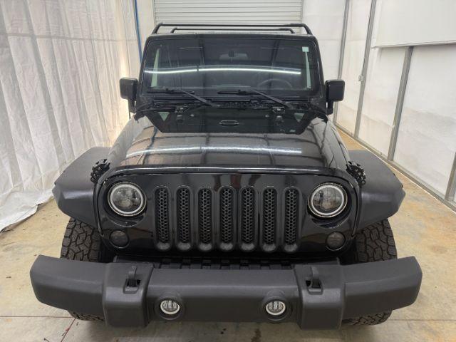 2017 Black /Black Jeep Wrangler Unlimited Sport 4x4 (1C4BJWDG1HL) with an Pentastar 3.6L V-6 DOHC engine, located at 1806 Veterans Memorial Hwy SW, Austell, GA, 30168, (770) 944-9558, 33.817959, -84.606987 - Photo#2