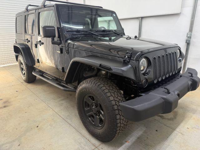 2017 Black /Black Jeep Wrangler Unlimited Sport 4x4 (1C4BJWDG1HL) with an Pentastar 3.6L V-6 DOHC engine, located at 1806 Veterans Memorial Hwy SW, Austell, GA, 30168, (770) 944-9558, 33.817959, -84.606987 - Photo#3