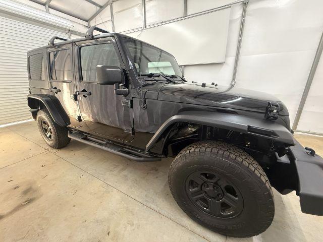 2017 Black /Black Jeep Wrangler Unlimited Sport 4x4 (1C4BJWDG1HL) with an Pentastar 3.6L V-6 DOHC engine, located at 1806 Veterans Memorial Hwy SW, Austell, GA, 30168, (770) 944-9558, 33.817959, -84.606987 - Photo#4