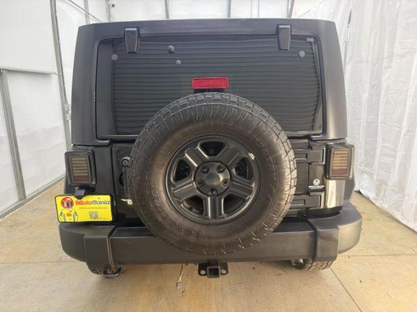 2017 Black /Black Jeep Wrangler Unlimited Sport 4x4 (1C4BJWDG1HL) with an Pentastar 3.6L V-6 DOHC engine, located at 1806 Veterans Memorial Hwy SW, Austell, GA, 30168, (770) 944-9558, 33.817959, -84.606987 - Photo#5