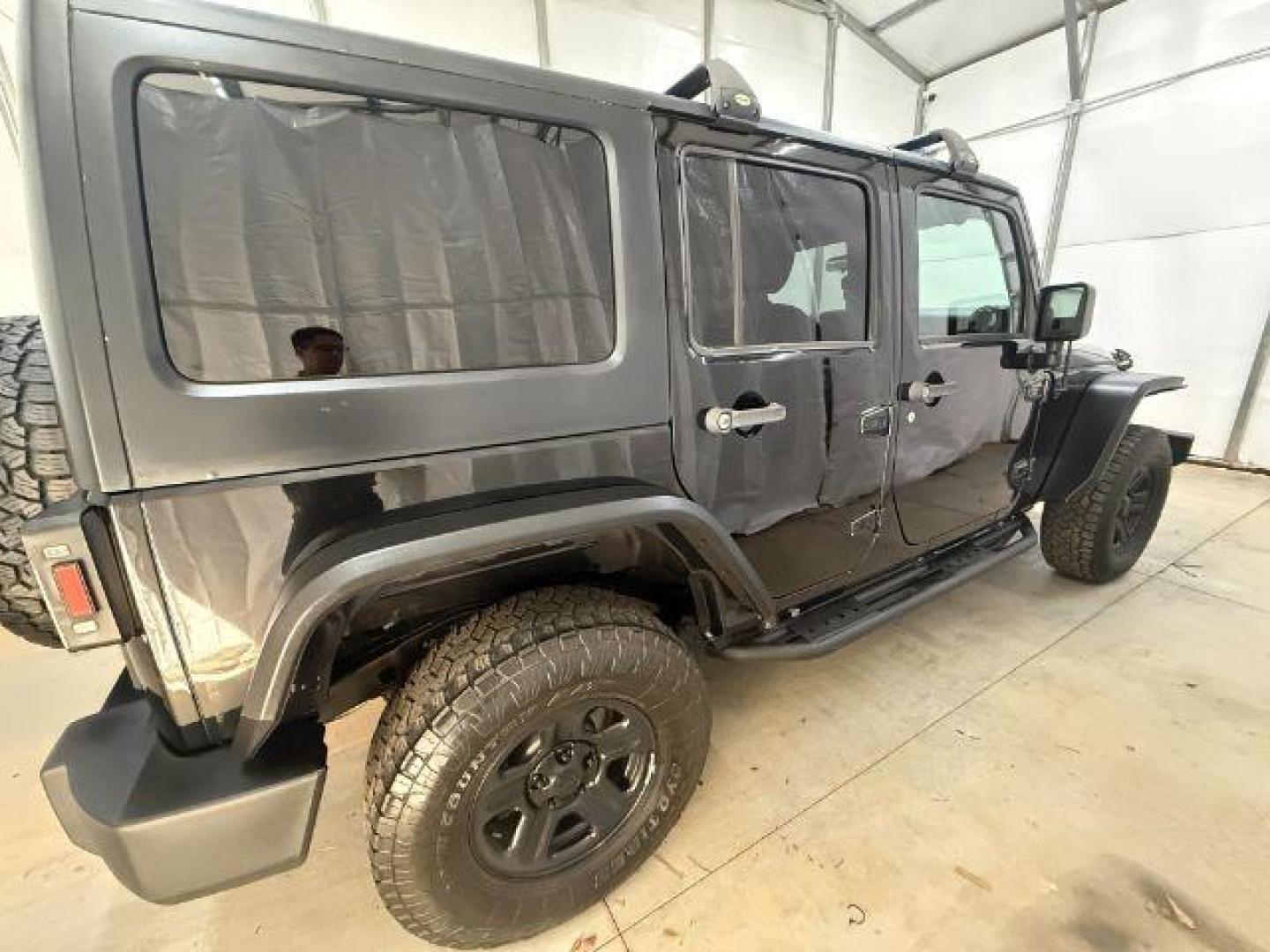 2017 Black /Black Jeep Wrangler Unlimited Sport 4x4 (1C4BJWDG1HL) with an Pentastar 3.6L V-6 DOHC engine, located at 1806 Veterans Memorial Hwy SW, Austell, GA, 30168, (770) 944-9558, 33.817959, -84.606987 - Photo#6