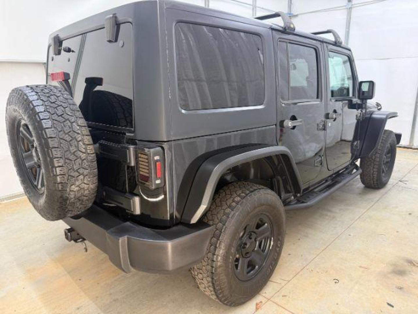 2017 Black /Black Jeep Wrangler Unlimited Sport 4x4 (1C4BJWDG1HL) with an Pentastar 3.6L V-6 DOHC engine, located at 1806 Veterans Memorial Hwy SW, Austell, GA, 30168, (770) 944-9558, 33.817959, -84.606987 - Photo#7
