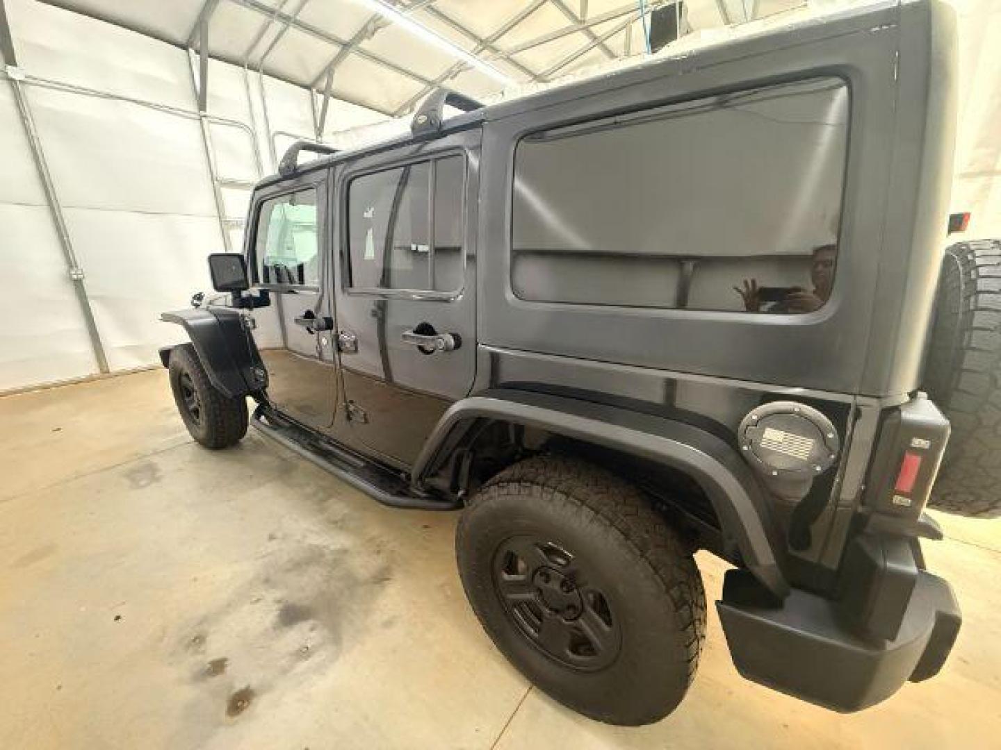 2017 Black /Black Jeep Wrangler Unlimited Sport 4x4 (1C4BJWDG1HL) with an Pentastar 3.6L V-6 DOHC engine, located at 1806 Veterans Memorial Hwy SW, Austell, GA, 30168, (770) 944-9558, 33.817959, -84.606987 - Photo#9