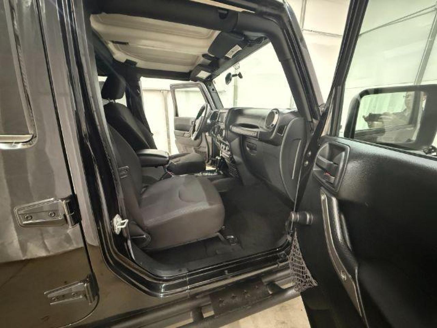 2017 Black /Black Jeep Wrangler Unlimited Sport 4x4 (1C4BJWDG1HL) with an Pentastar 3.6L V-6 DOHC engine, located at 1806 Veterans Memorial Hwy SW, Austell, GA, 30168, (770) 944-9558, 33.817959, -84.606987 - Photo#12