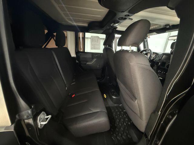 2017 Black /Black Jeep Wrangler Unlimited Sport 4x4 (1C4BJWDG1HL) with an Pentastar 3.6L V-6 DOHC engine, located at 1806 Veterans Memorial Hwy SW, Austell, GA, 30168, (770) 944-9558, 33.817959, -84.606987 - Photo#14