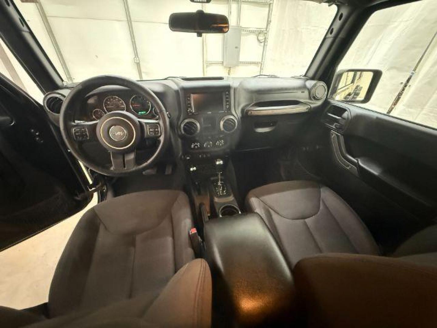 2017 Black /Black Jeep Wrangler Unlimited Sport 4x4 (1C4BJWDG1HL) with an Pentastar 3.6L V-6 DOHC engine, located at 1806 Veterans Memorial Hwy SW, Austell, GA, 30168, (770) 944-9558, 33.817959, -84.606987 - Photo#15