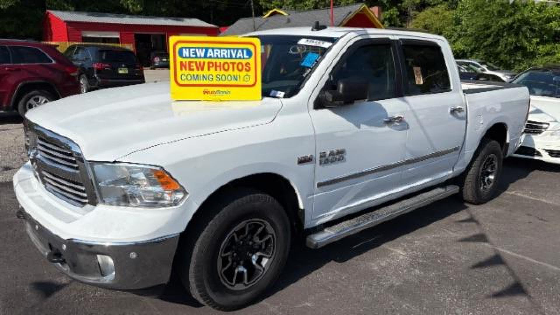 2017 White RAM 1500 SLT Crew Cab SWB 4WD (3C6RR7LT9HG) with an 5.7L V8 OHV 16V engine, 8-Speed Automatic transmission, located at 1806 Veterans Memorial Hwy SW, Austell, GA, 30168, (770) 944-9558, 33.817959, -84.606987 - Photo#0