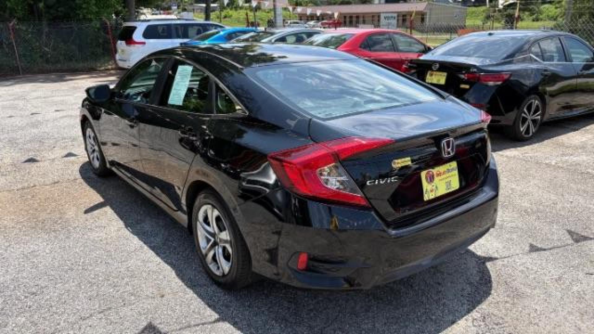 2017 Black Honda Civic LX (19XFC2F56HE) with an 2L I-4 DOHC engine, located at 1806 Veterans Memorial Hwy SW, Austell, GA, 30168, (770) 944-9558, 33.817959, -84.606987 - Photo#5
