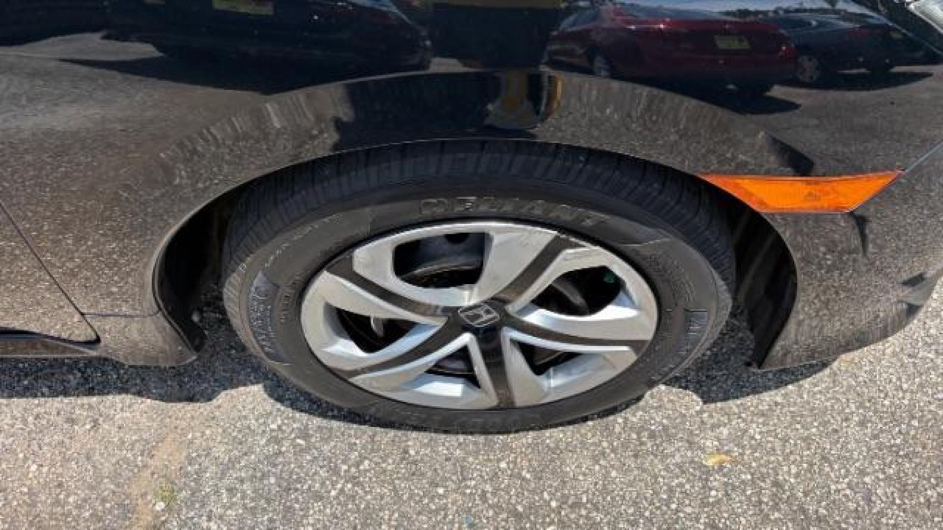 2017 Black Honda Civic LX (19XFC2F56HE) with an 2L I-4 DOHC engine, located at 1806 Veterans Memorial Hwy SW, Austell, GA, 30168, (770) 944-9558, 33.817959, -84.606987 - Photo#14