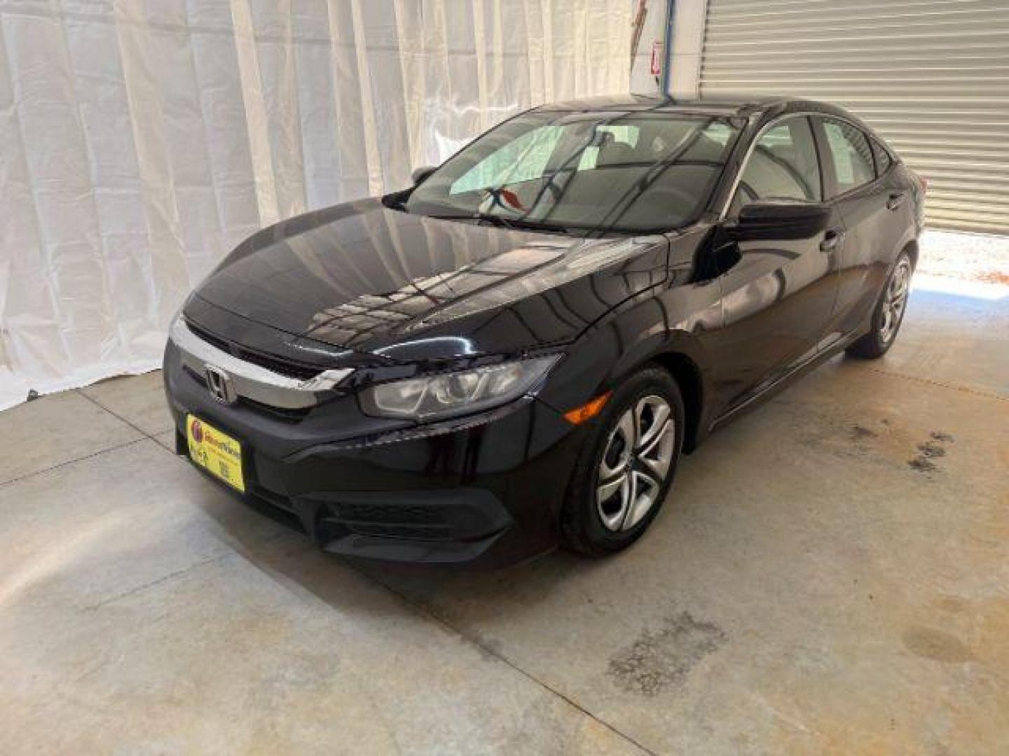 2017 Black Honda Civic LX (19XFC2F56HE) with an 2L I-4 DOHC engine, located at 1806 Veterans Memorial Hwy SW, Austell, GA, 30168, (770) 944-9558, 33.817959, -84.606987 - Photo#0