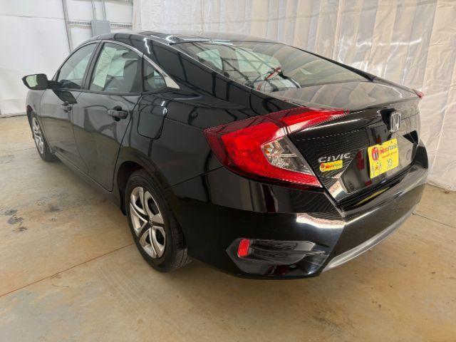 2017 Black Honda Civic LX (19XFC2F56HE) with an 2L I-4 DOHC engine, located at 1806 Veterans Memorial Hwy SW, Austell, GA, 30168, (770) 944-9558, 33.817959, -84.606987 - Photo#3