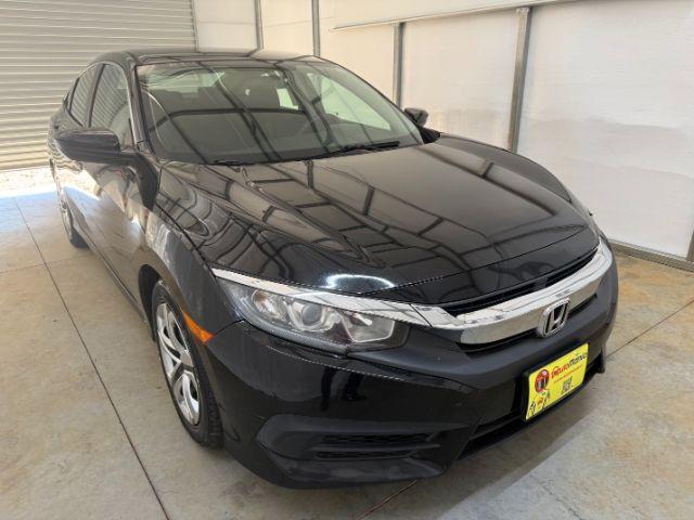 2017 Black Honda Civic LX (19XFC2F56HE) with an 2L I-4 DOHC engine, located at 1806 Veterans Memorial Hwy SW, Austell, GA, 30168, (770) 944-9558, 33.817959, -84.606987 - Photo#8