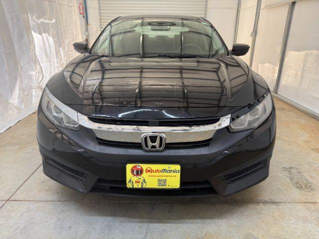 2017 Black Honda Civic LX (19XFC2F56HE) with an 2L I-4 DOHC engine, located at 1806 Veterans Memorial Hwy SW, Austell, GA, 30168, (770) 944-9558, 33.817959, -84.606987 - Photo#9