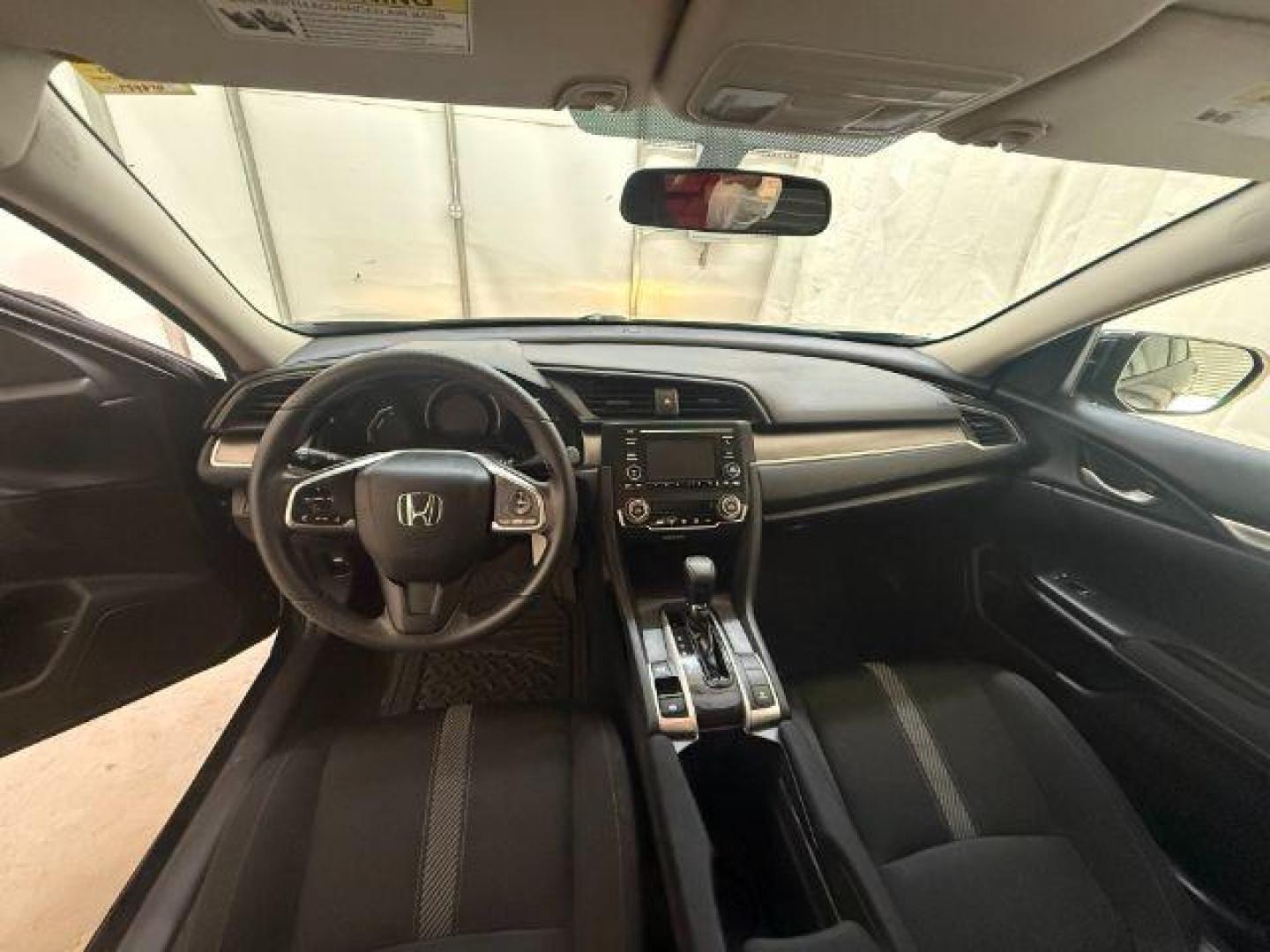 2017 Black Honda Civic LX (19XFC2F56HE) with an 2L I-4 DOHC engine, located at 1806 Veterans Memorial Hwy SW, Austell, GA, 30168, (770) 944-9558, 33.817959, -84.606987 - Photo#11