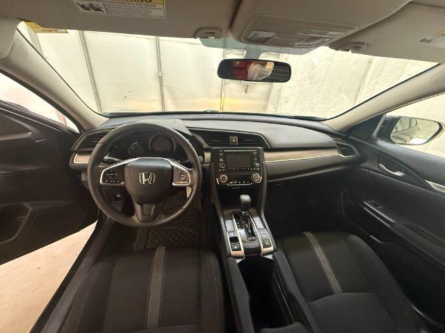 2017 Black Honda Civic LX (19XFC2F56HE) with an 2L I-4 DOHC engine, located at 1806 Veterans Memorial Hwy SW, Austell, GA, 30168, (770) 944-9558, 33.817959, -84.606987 - Photo#11