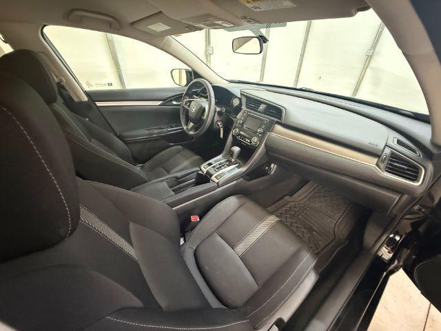 2017 Black Honda Civic LX (19XFC2F56HE) with an 2L I-4 DOHC engine, located at 1806 Veterans Memorial Hwy SW, Austell, GA, 30168, (770) 944-9558, 33.817959, -84.606987 - Photo#14