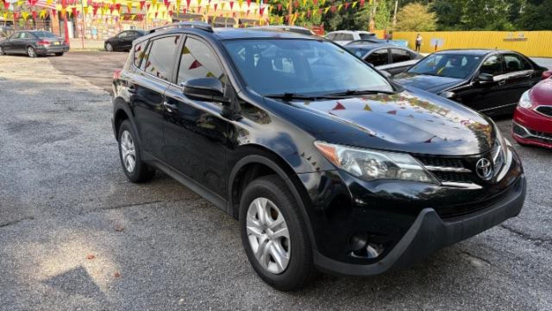 2015 Black Toyota RAV4 LE (2T3ZFREV8FW) with an 2.5L I-4 DOHC engine, located at 1806 Veterans Memorial Hwy SW, Austell, GA, 30168, (770) 944-9558, 33.817959, -84.606987 - Photo#2