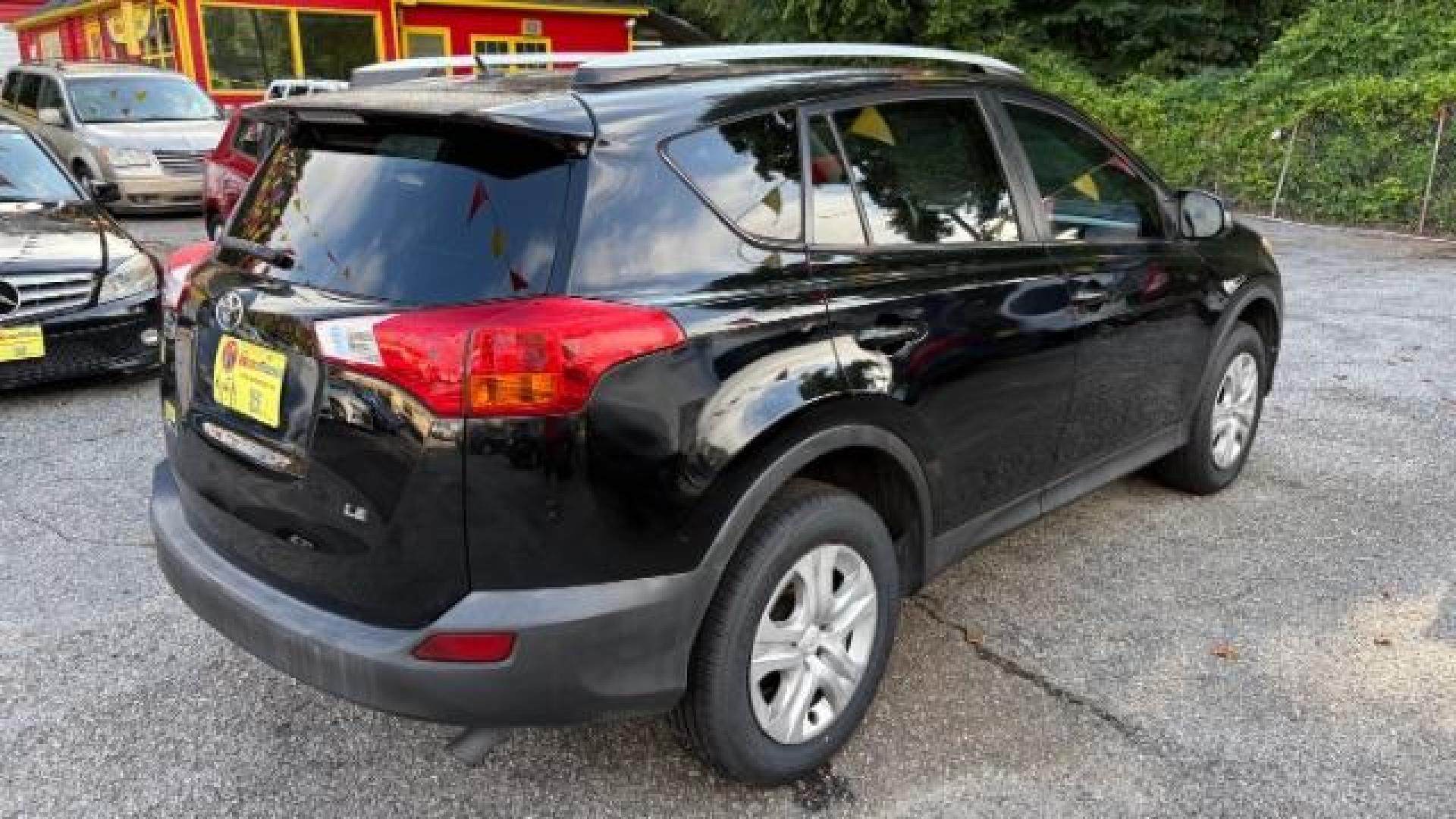 2015 Black Toyota RAV4 LE (2T3ZFREV8FW) with an 2.5L I-4 DOHC engine, located at 1806 Veterans Memorial Hwy SW, Austell, GA, 30168, (770) 944-9558, 33.817959, -84.606987 - Photo#3