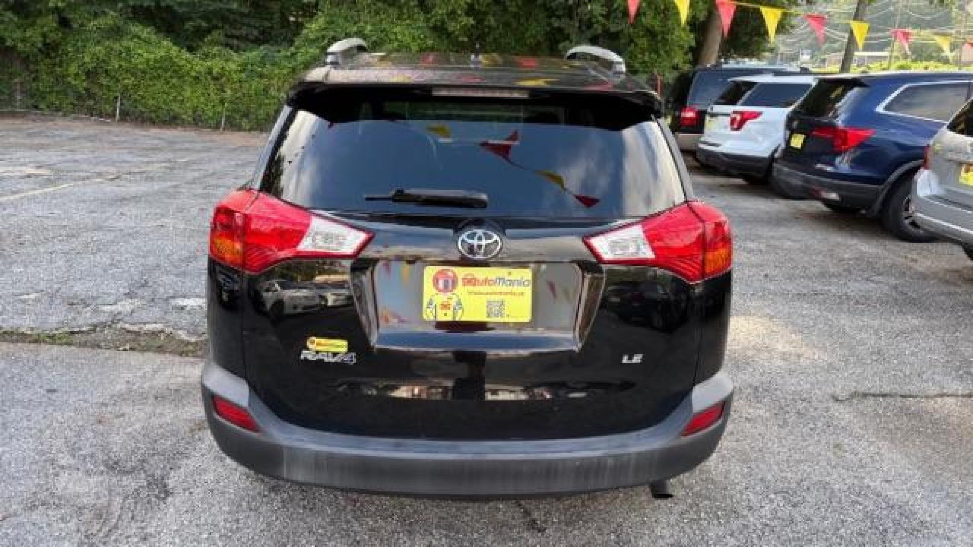 2015 Black Toyota RAV4 LE (2T3ZFREV8FW) with an 2.5L I-4 DOHC engine, located at 1806 Veterans Memorial Hwy SW, Austell, GA, 30168, (770) 944-9558, 33.817959, -84.606987 - Photo#4