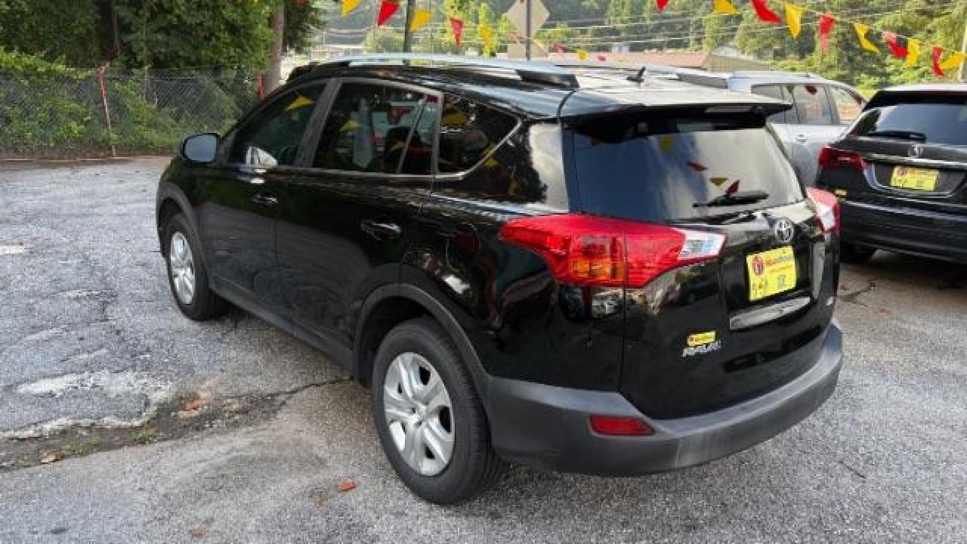 2015 Black Toyota RAV4 LE (2T3ZFREV8FW) with an 2.5L I-4 DOHC engine, located at 1806 Veterans Memorial Hwy SW, Austell, GA, 30168, (770) 944-9558, 33.817959, -84.606987 - Photo#5