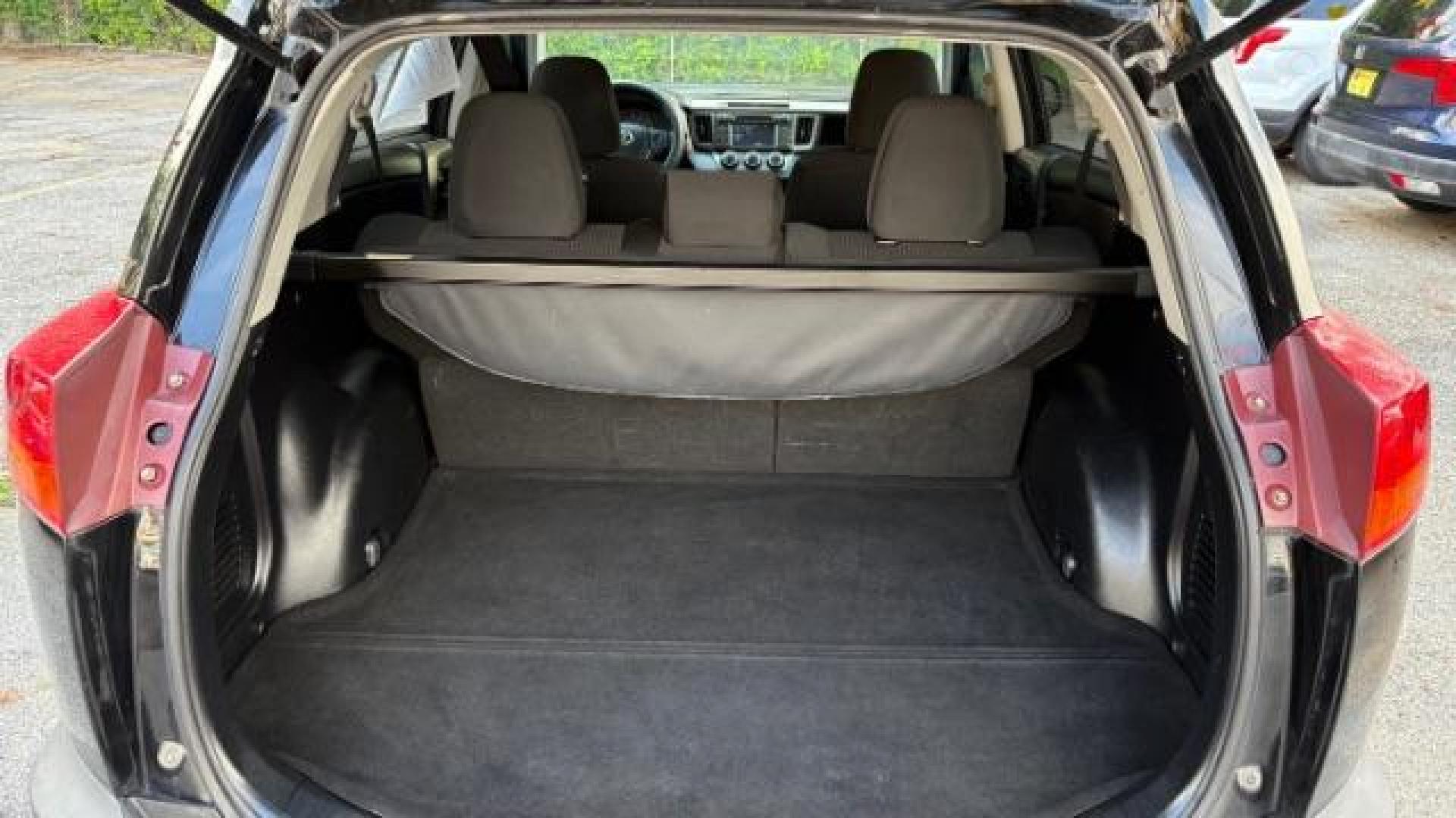 2015 Black Toyota RAV4 LE (2T3ZFREV8FW) with an 2.5L I-4 DOHC engine, located at 1806 Veterans Memorial Hwy SW, Austell, GA, 30168, (770) 944-9558, 33.817959, -84.606987 - Photo#6