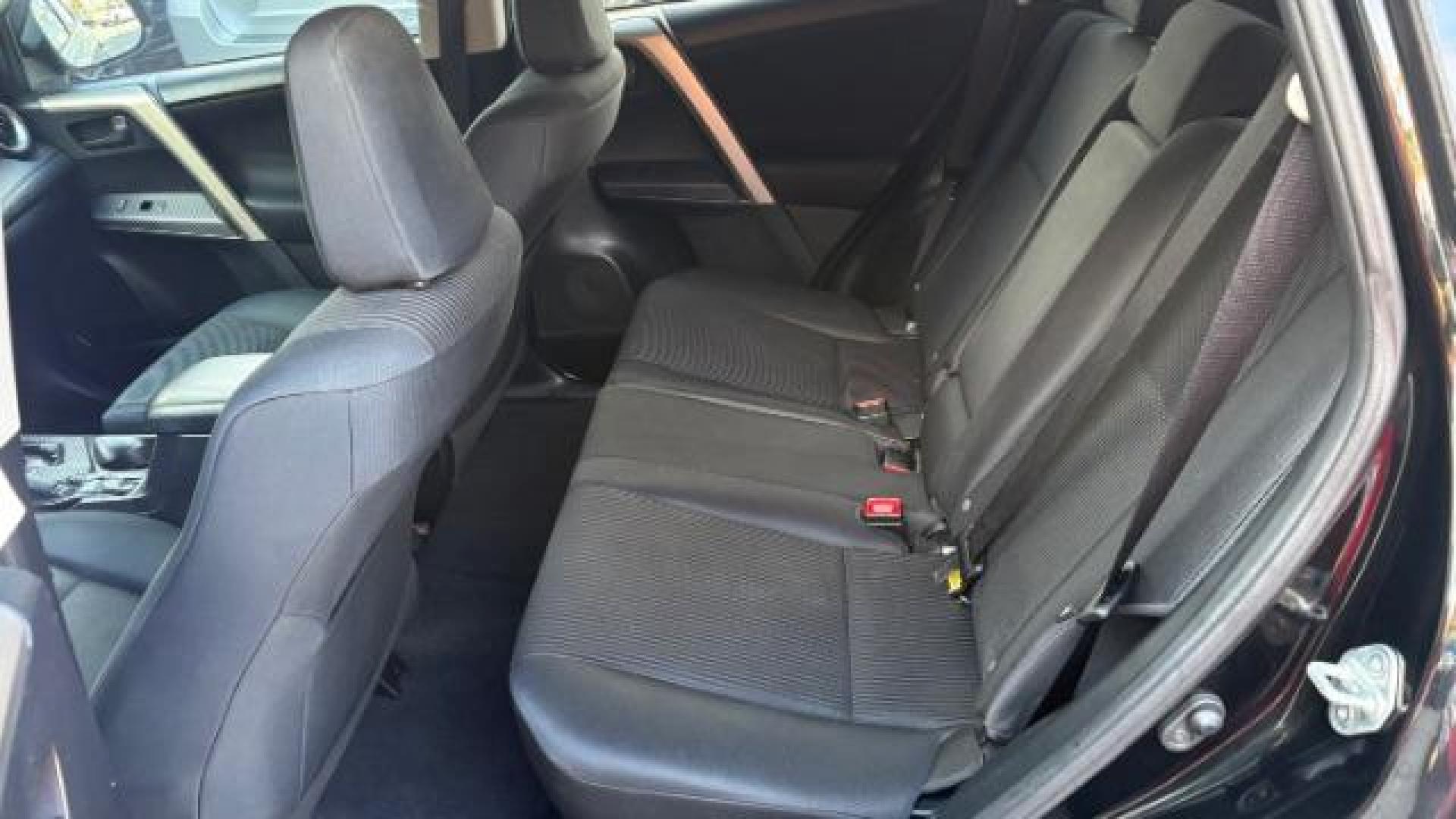 2015 Black Toyota RAV4 LE (2T3ZFREV8FW) with an 2.5L I-4 DOHC engine, located at 1806 Veterans Memorial Hwy SW, Austell, GA, 30168, (770) 944-9558, 33.817959, -84.606987 - Photo#7