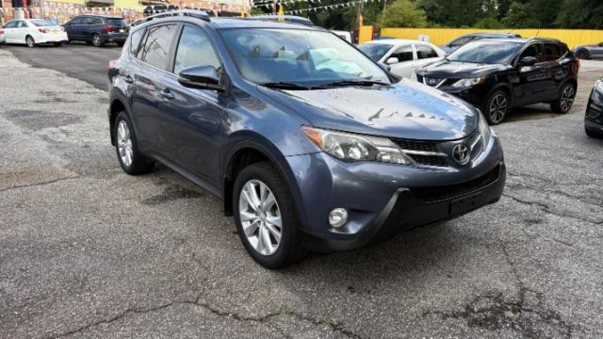 2013 Blue Toyota RAV4 Limited (2T3DFREV5DW) with an 2.5L I-4 DOHC engine, located at 1806 Veterans Memorial Hwy SW, Austell, GA, 30168, (770) 944-9558, 33.817959, -84.606987 - Photo#2