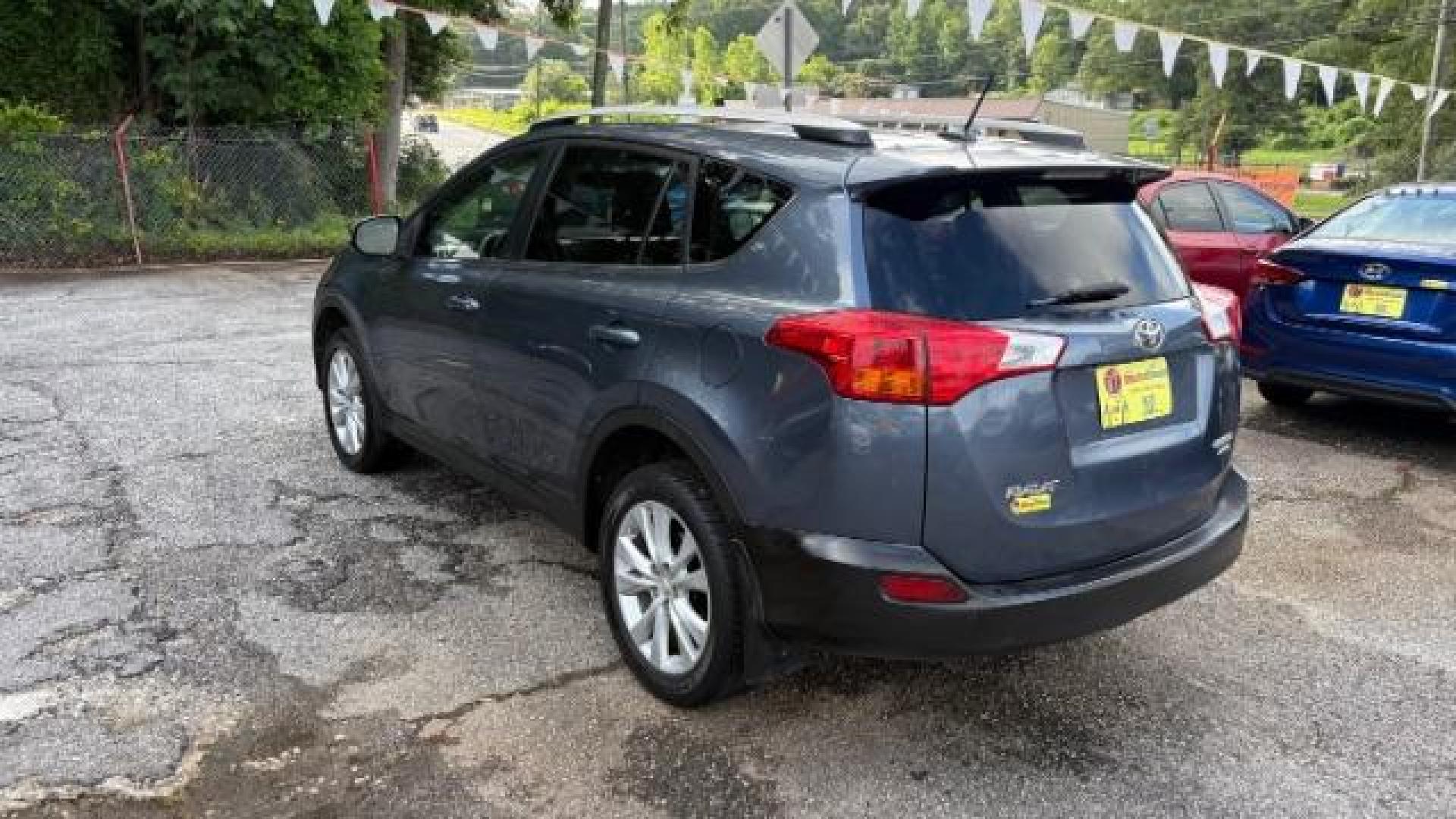 2013 Blue Toyota RAV4 Limited (2T3DFREV5DW) with an 2.5L I-4 DOHC engine, located at 1806 Veterans Memorial Hwy SW, Austell, GA, 30168, (770) 944-9558, 33.817959, -84.606987 - Photo#5