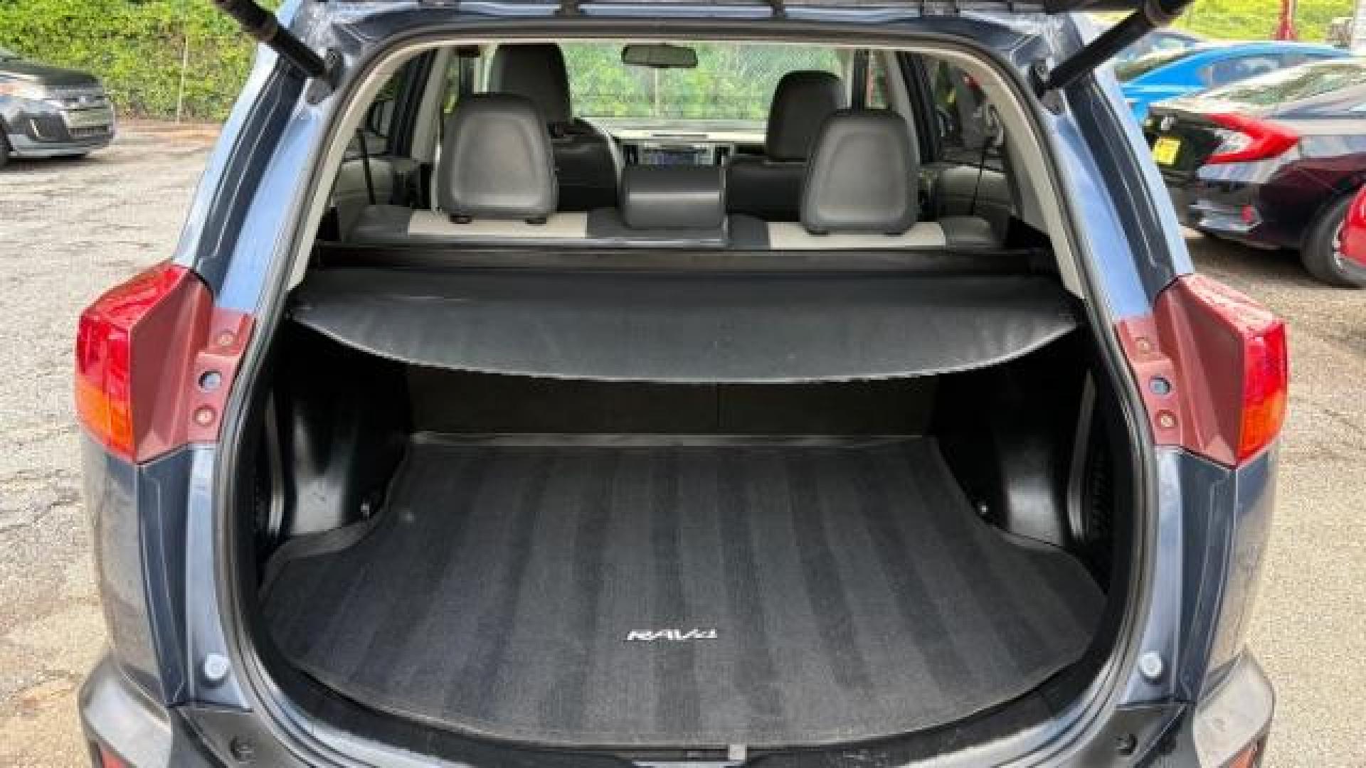 2013 Blue Toyota RAV4 Limited (2T3DFREV5DW) with an 2.5L I-4 DOHC engine, located at 1806 Veterans Memorial Hwy SW, Austell, GA, 30168, (770) 944-9558, 33.817959, -84.606987 - Photo#8