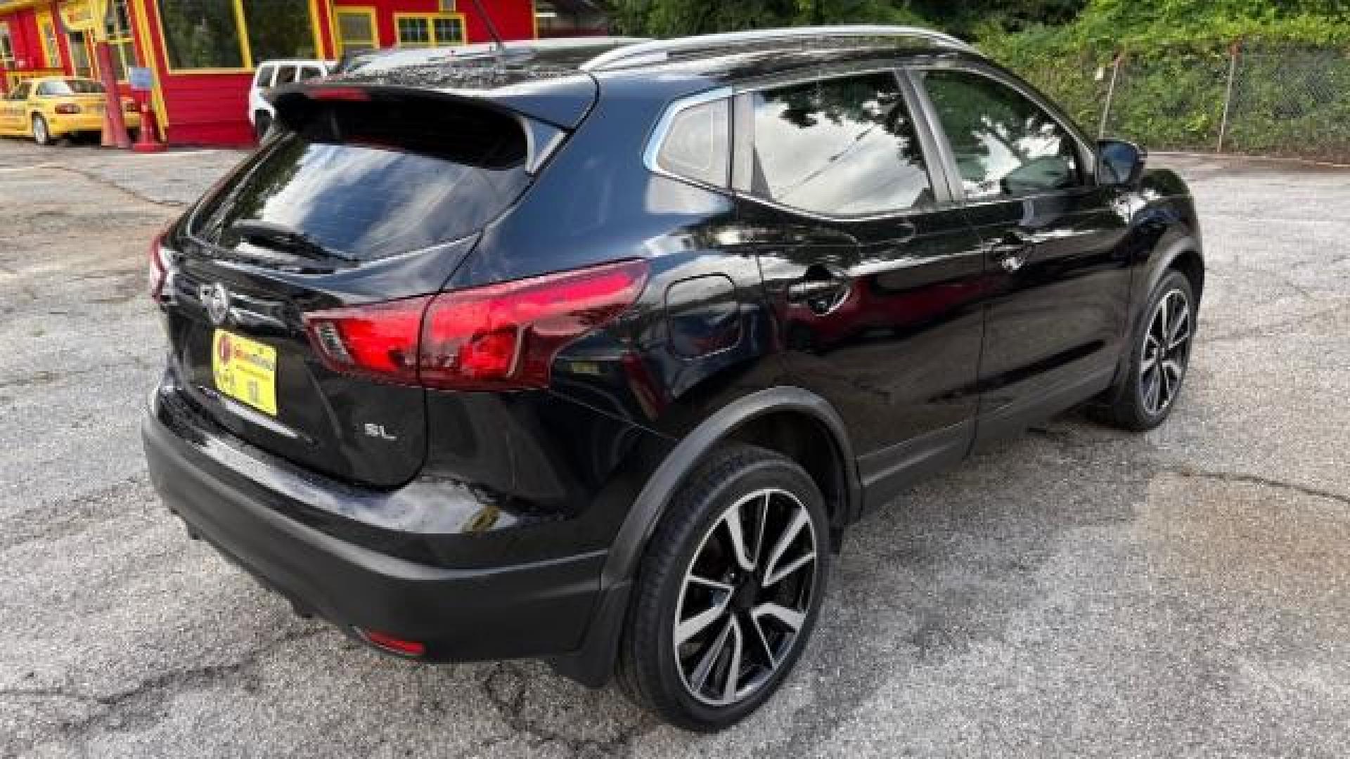 2017 Black Nissan Rogue Sport SL (JN1BJ1CP1HW) with an 2L I-4 gasoline direct injection engine, located at 1806 Veterans Memorial Hwy SW, Austell, GA, 30168, (770) 944-9558, 33.817959, -84.606987 - Photo#1