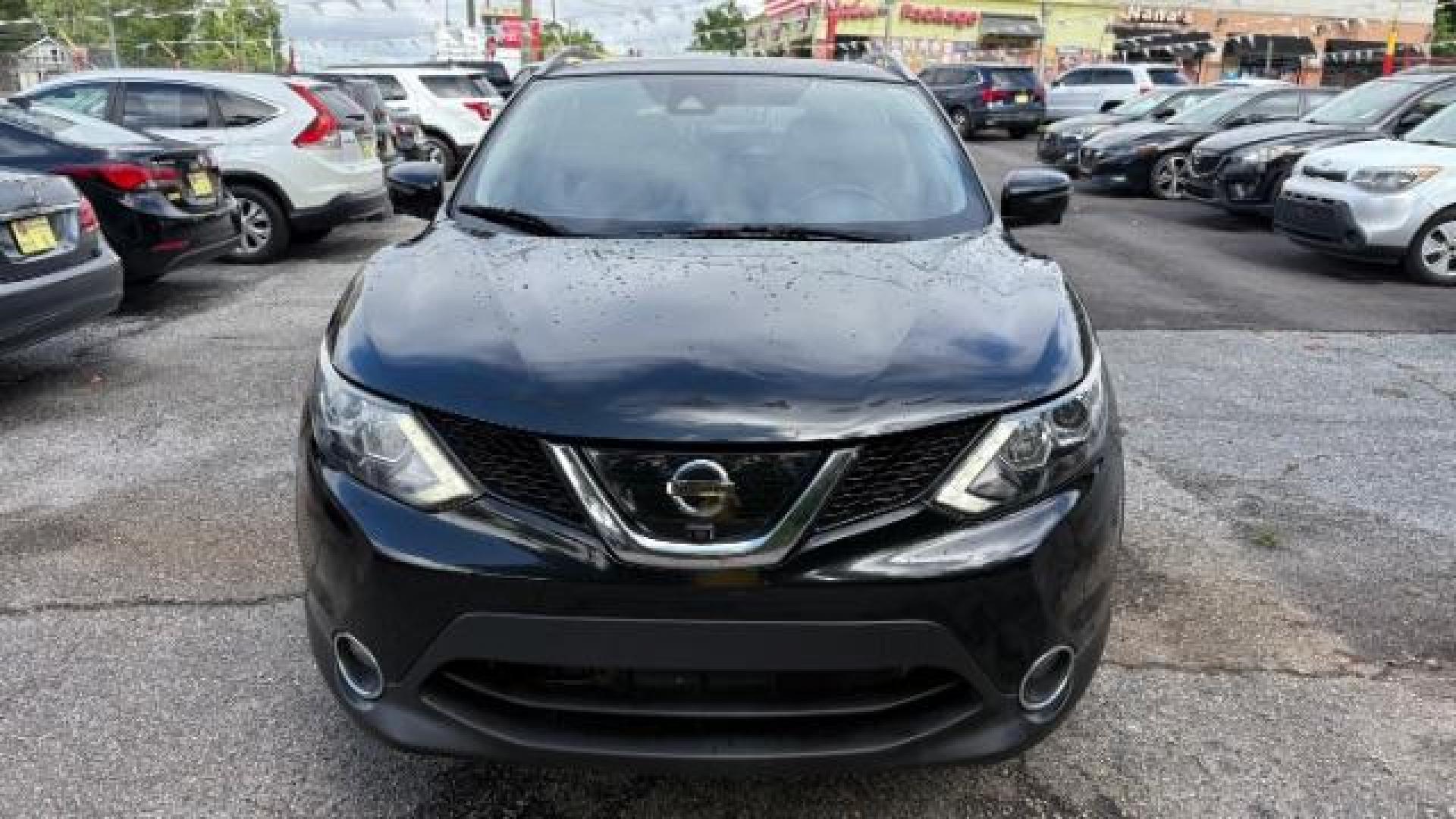 2017 Black Nissan Rogue Sport SL (JN1BJ1CP1HW) with an 2L I-4 gasoline direct injection engine, located at 1806 Veterans Memorial Hwy SW, Austell, GA, 30168, (770) 944-9558, 33.817959, -84.606987 - Photo#2