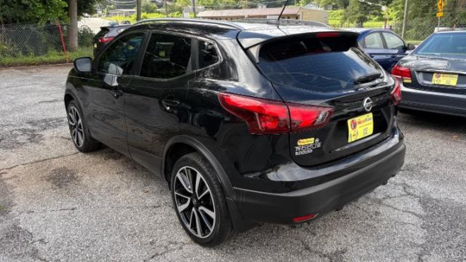 2017 Black Nissan Rogue Sport SL (JN1BJ1CP1HW) with an 2L I-4 gasoline direct injection engine, located at 1806 Veterans Memorial Hwy SW, Austell, GA, 30168, (770) 944-9558, 33.817959, -84.606987 - Photo#3