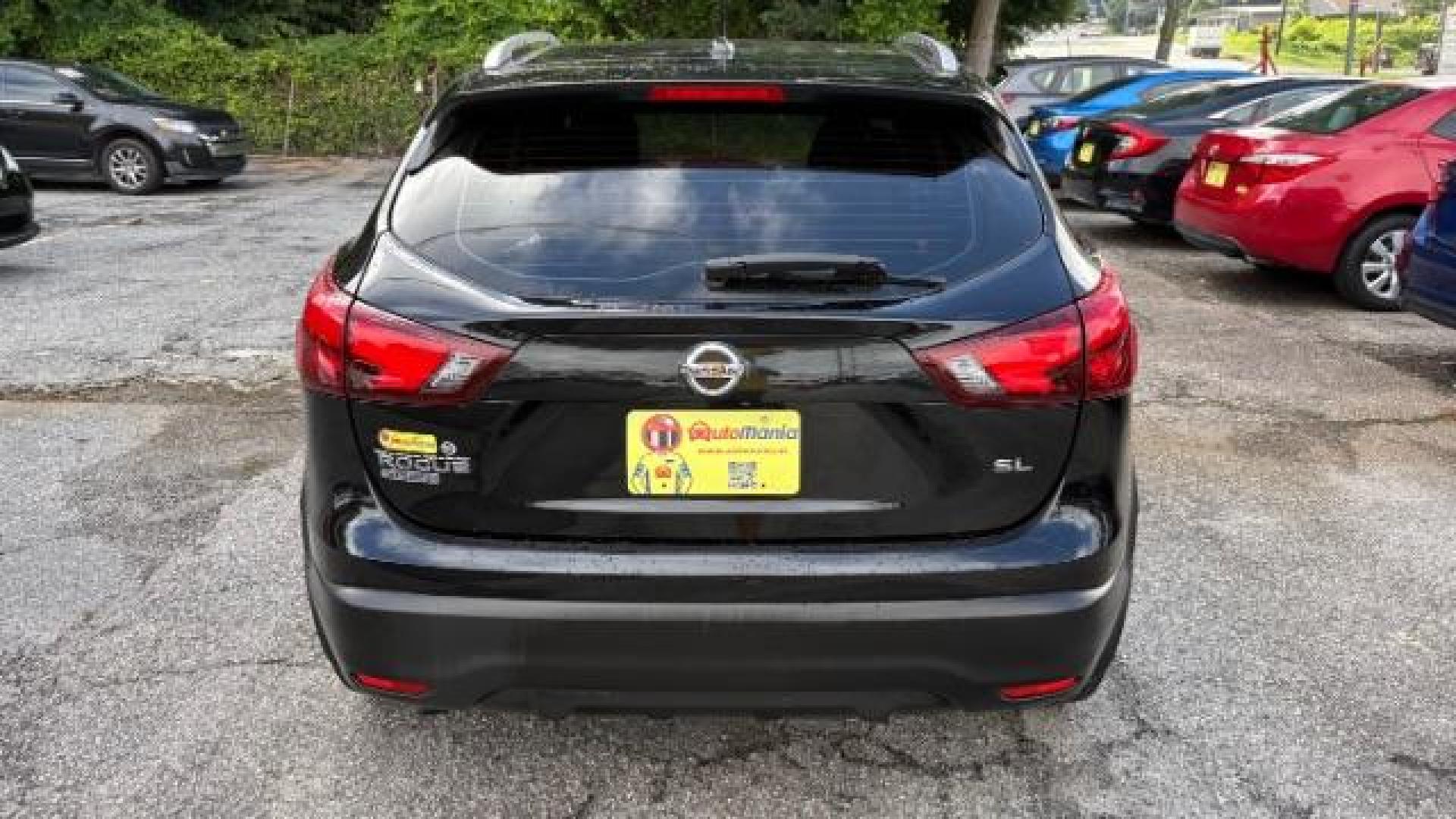 2017 Black Nissan Rogue Sport SL (JN1BJ1CP1HW) with an 2L I-4 gasoline direct injection engine, located at 1806 Veterans Memorial Hwy SW, Austell, GA, 30168, (770) 944-9558, 33.817959, -84.606987 - Photo#5
