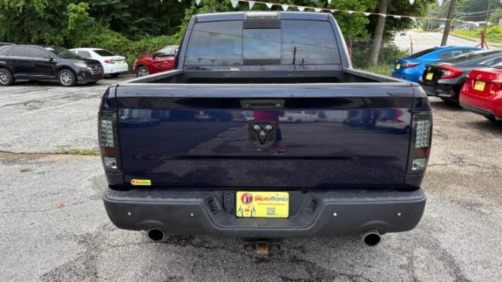 2016 Blue Ram 1500 Laramie (1C6RR7NT1GS) , located at 1806 Veterans Memorial Hwy SW, Austell, GA, 30168, (770) 944-9558, 33.817959, -84.606987 - Photo#4