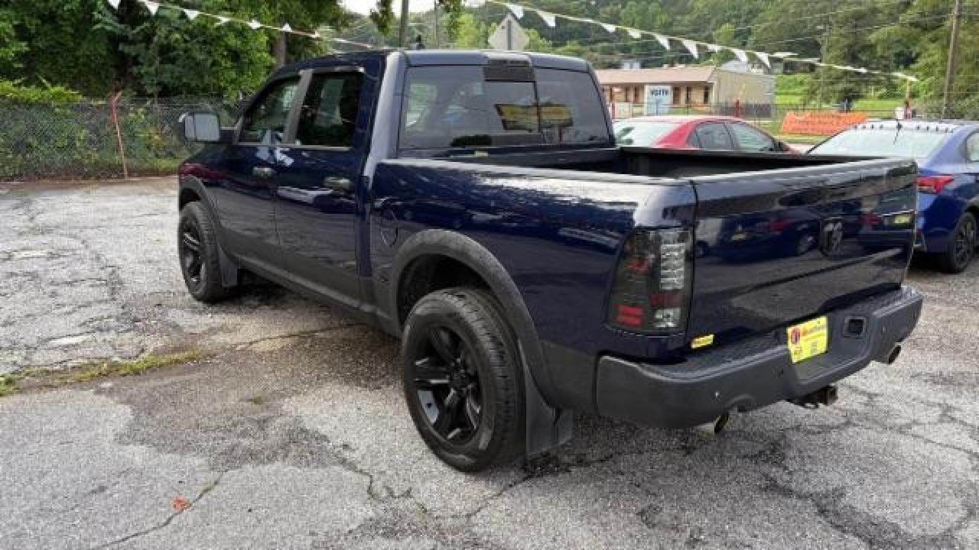 2016 Blue Ram 1500 Laramie (1C6RR7NT1GS) , located at 1806 Veterans Memorial Hwy SW, Austell, GA, 30168, (770) 944-9558, 33.817959, -84.606987 - Photo#5