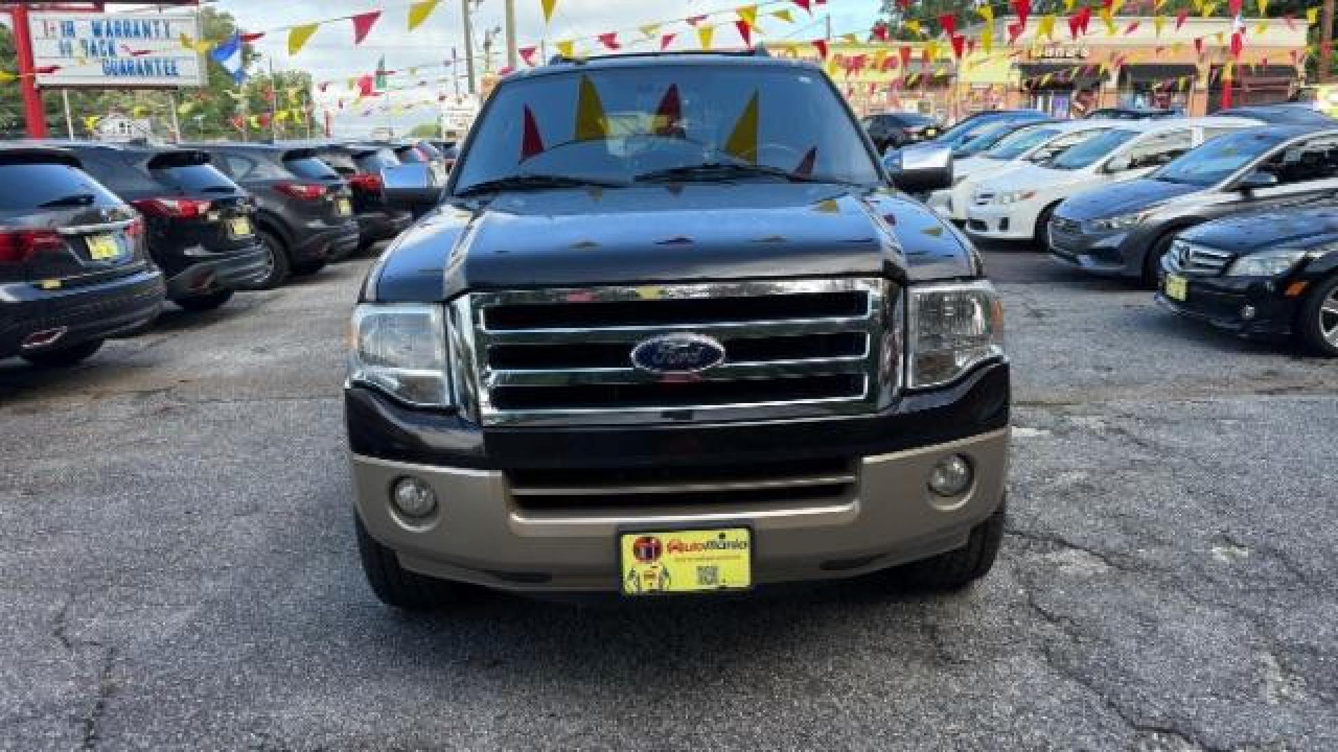 2014 Black Ford Expedition King Ranch (1FMJU1H55EE) with an Triton 5.4L V-8 variable valve control engine, located at 1806 Veterans Memorial Hwy SW, Austell, GA, 30168, (770) 944-9558, 33.817959, -84.606987 - Photo#1