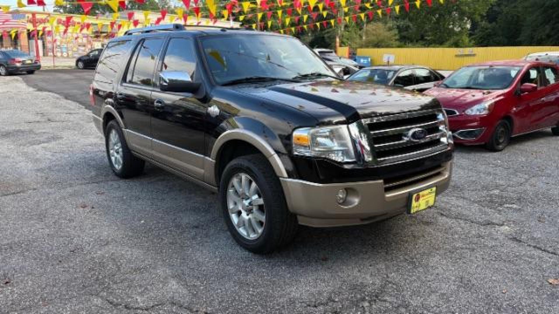 2014 Black Ford Expedition King Ranch (1FMJU1H55EE) with an Triton 5.4L V-8 variable valve control engine, located at 1806 Veterans Memorial Hwy SW, Austell, GA, 30168, (770) 944-9558, 33.817959, -84.606987 - Photo#2