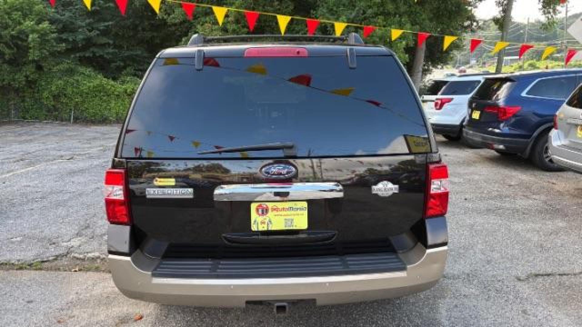 2014 Black Ford Expedition King Ranch (1FMJU1H55EE) with an Triton 5.4L V-8 variable valve control engine, located at 1806 Veterans Memorial Hwy SW, Austell, GA, 30168, (770) 944-9558, 33.817959, -84.606987 - Photo#3