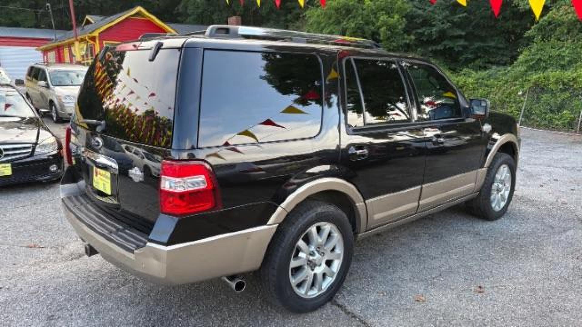 2014 Black Ford Expedition King Ranch (1FMJU1H55EE) with an Triton 5.4L V-8 variable valve control engine, located at 1806 Veterans Memorial Hwy SW, Austell, GA, 30168, (770) 944-9558, 33.817959, -84.606987 - Photo#5