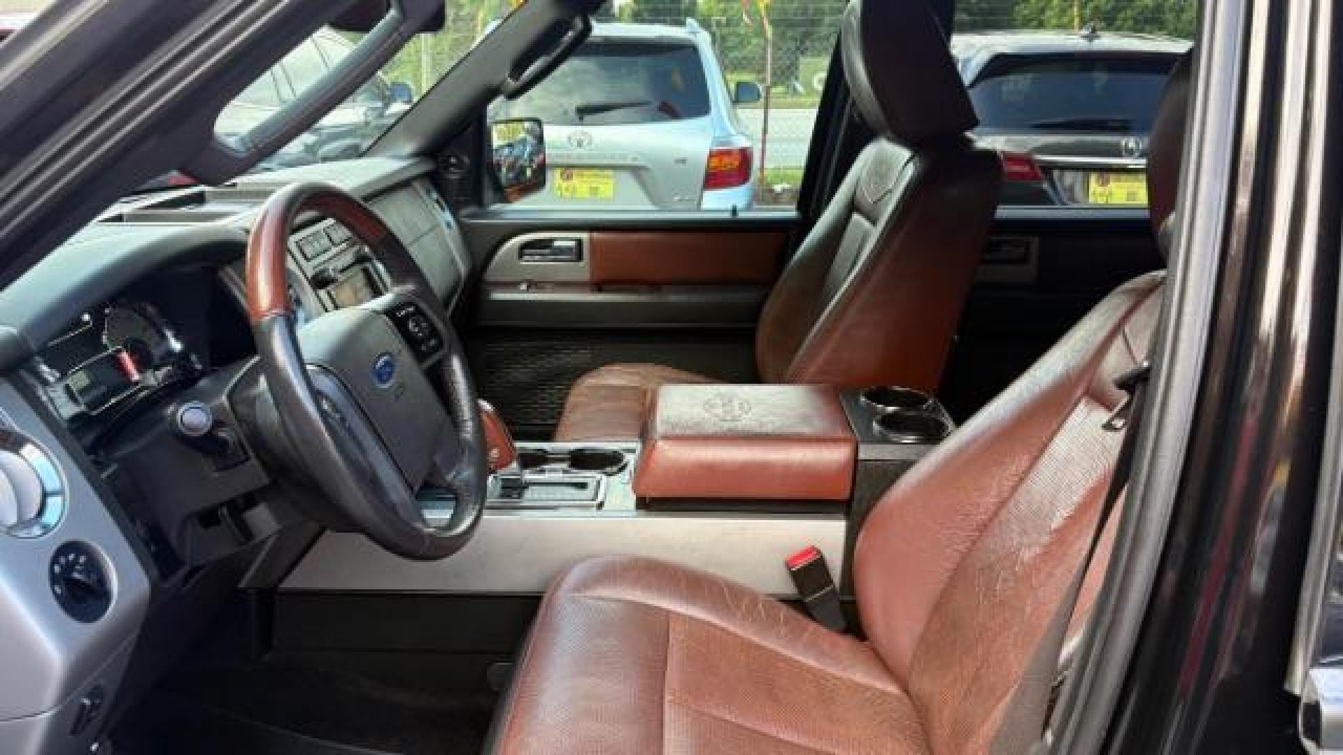 2014 Black Ford Expedition King Ranch (1FMJU1H55EE) with an Triton 5.4L V-8 variable valve control engine, located at 1806 Veterans Memorial Hwy SW, Austell, GA, 30168, (770) 944-9558, 33.817959, -84.606987 - Photo#6